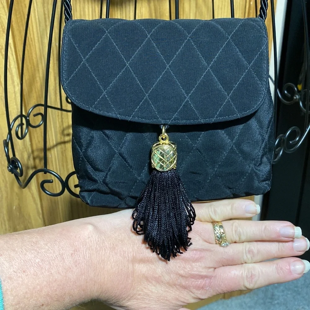 Neiman Marcus Gold Tassel Bag Small
Luxury purse​​ - Picture 6 of 11